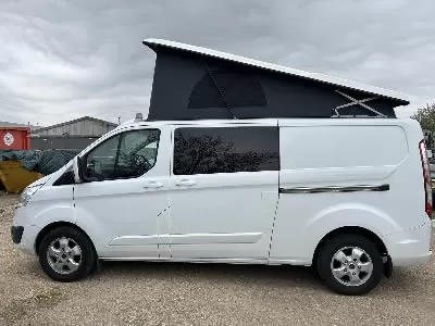 White Campervan with Roof up